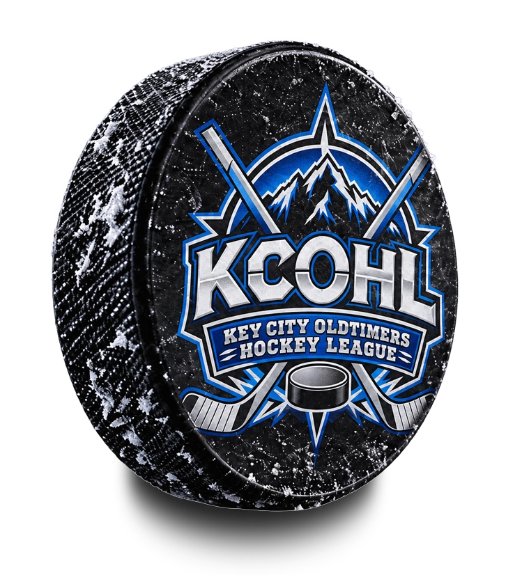 A snow-dusted hockey puck carrying the KCOHL crest